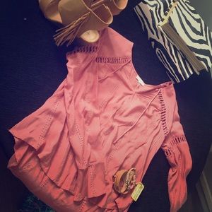 Blush color blouse with crochet details.